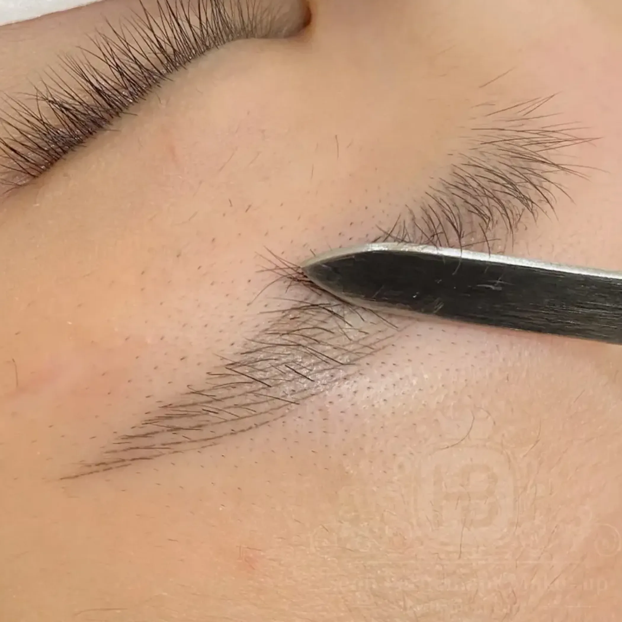 close-up of microblading procedure