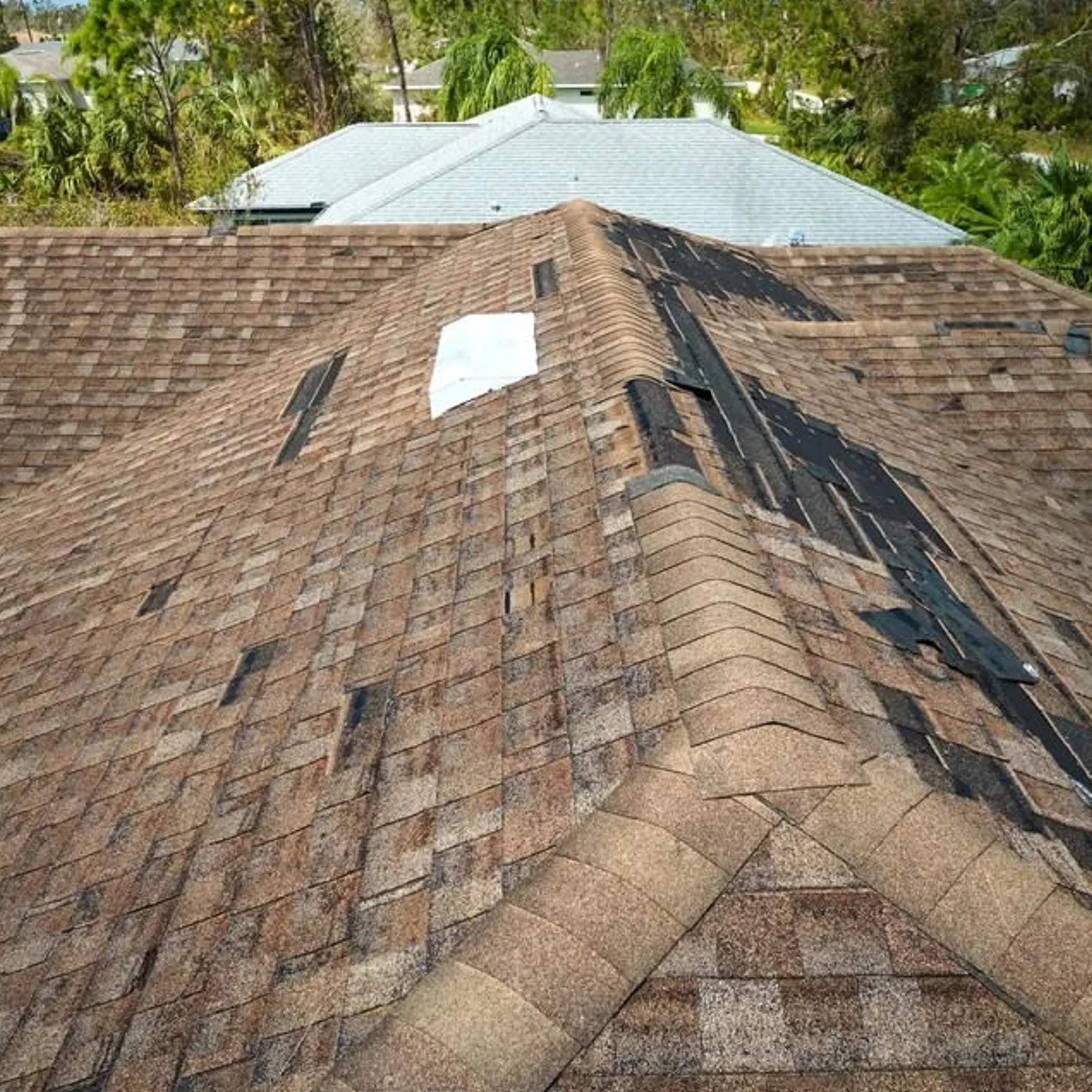 storm-damaged roof for inspection