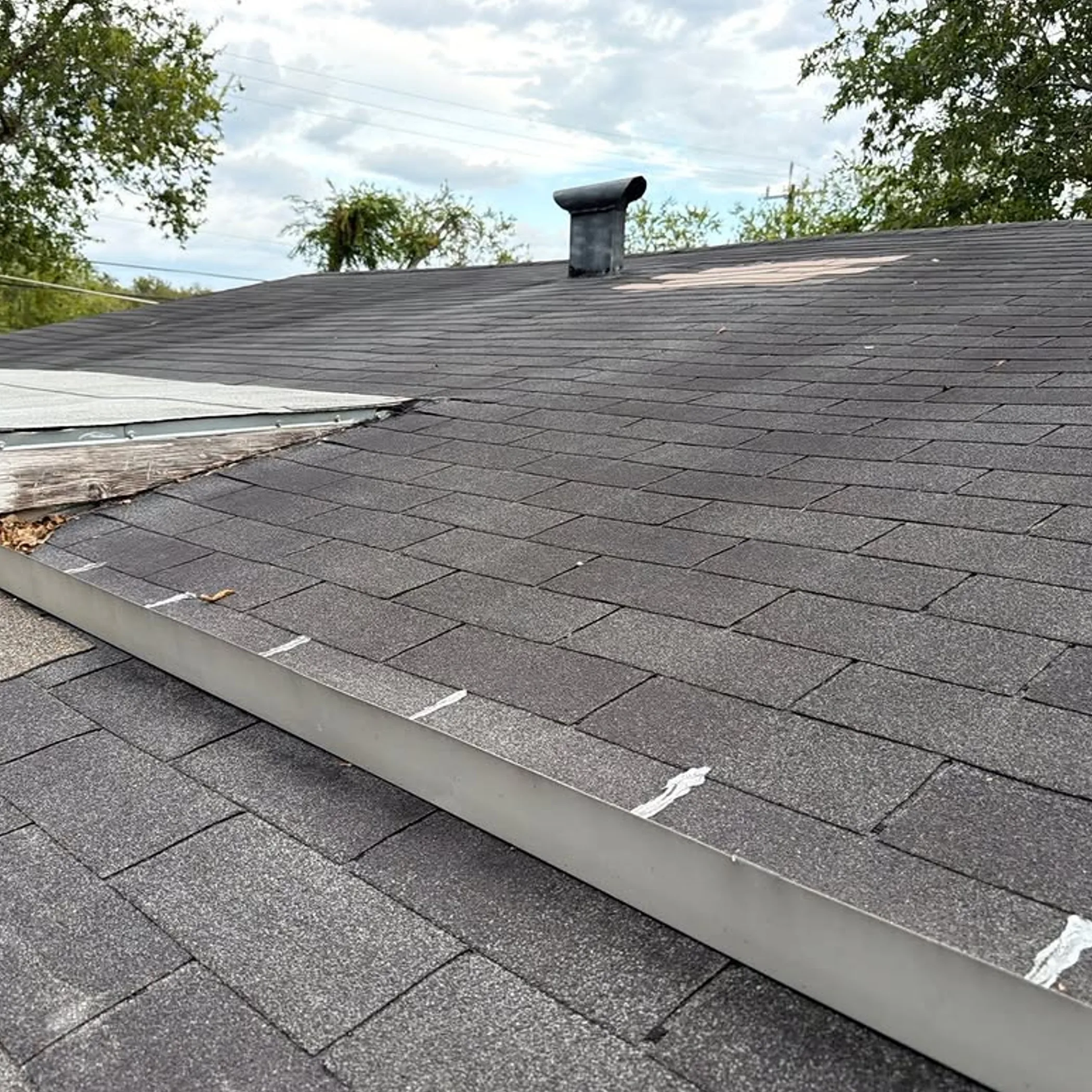 aging shingles and roof debris